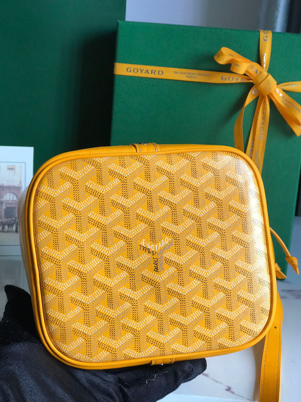 PETIT FLOT BUCKET BAG 22 IN YELLOW GOYARDINE CANVAS AND LAMBSKIN TRIM