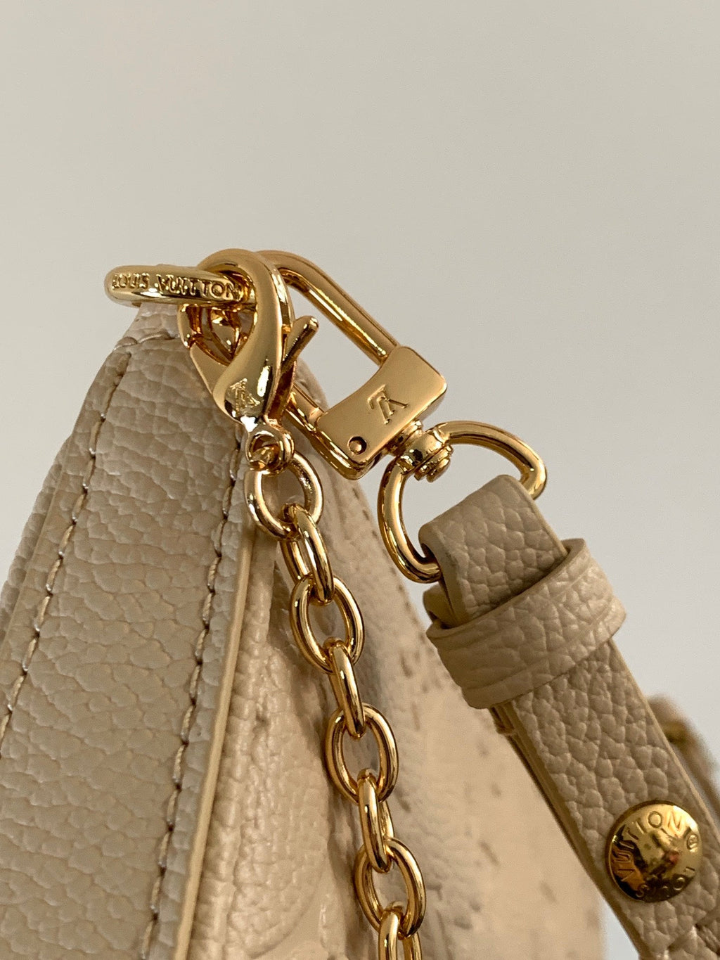 LOUIS VUITTON EASY POUCH ON STRAP 19 IN BEIGE MONOGRAM EMPREINTE LEATHER